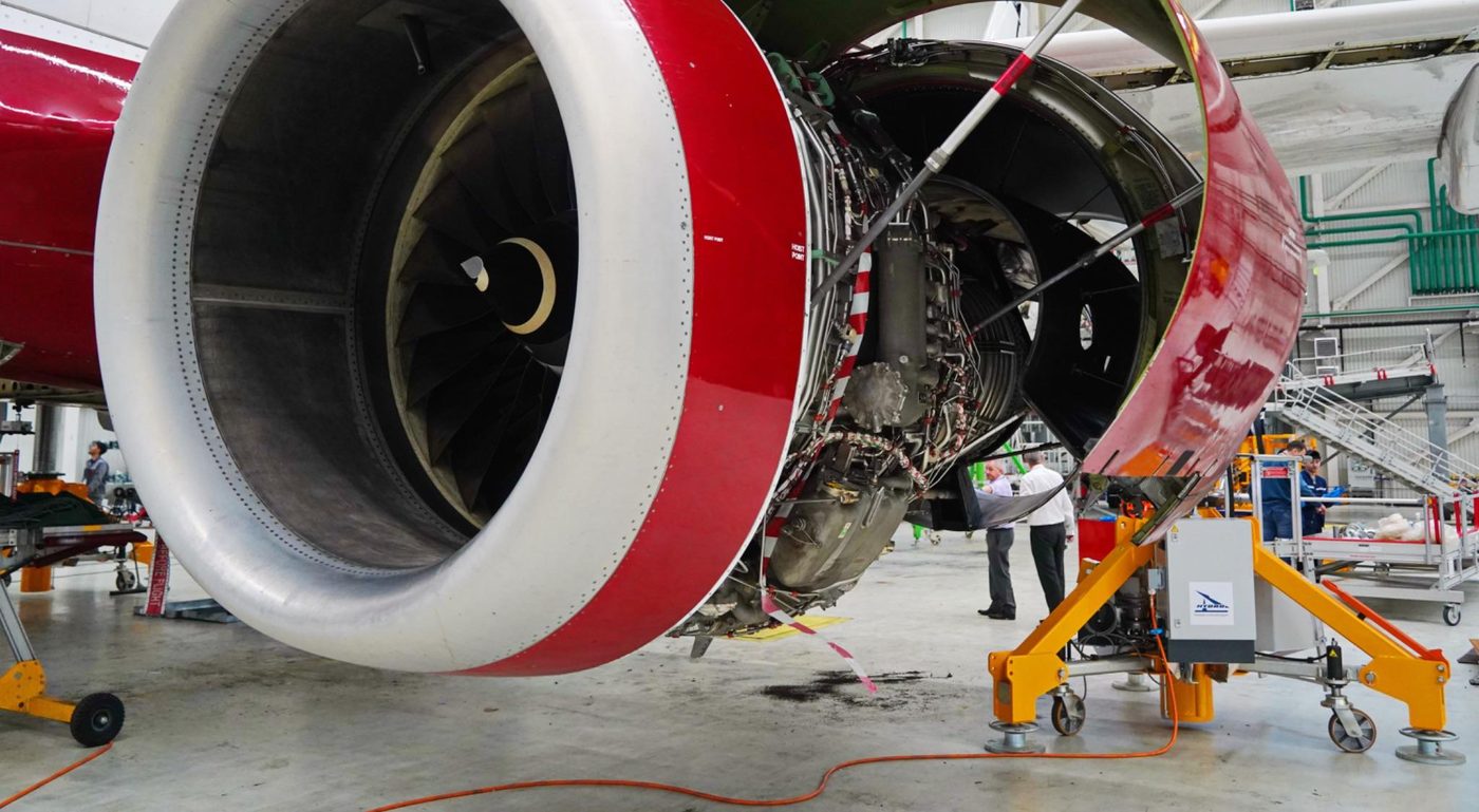 Aircraft engine with its cowlings open during maintenance